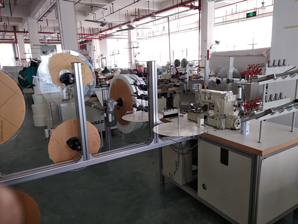 床垫拉手带绗缝切断机