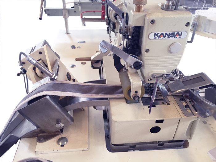 床垫拉手带绗缝切断机