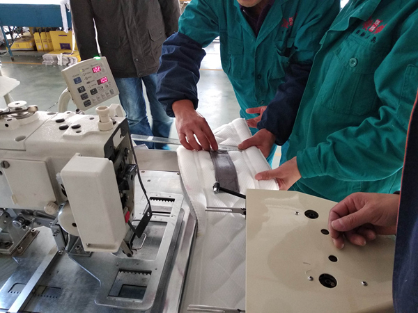 自动床垫拉手带缝合机