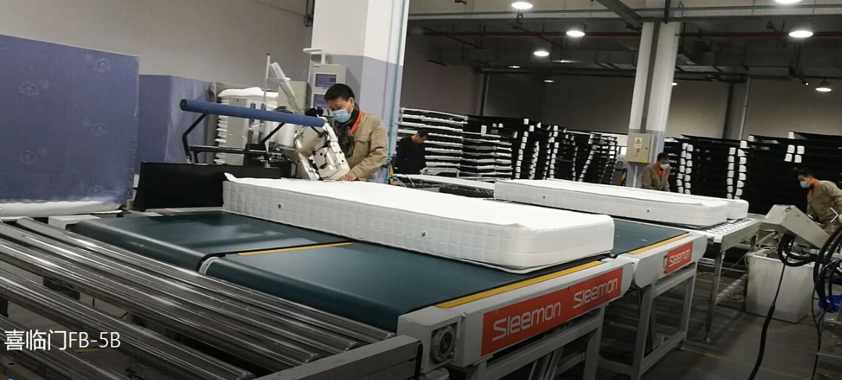 自动翻转床垫围边机