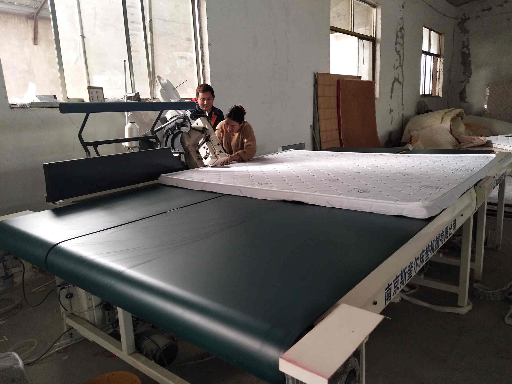 自动床垫围边机